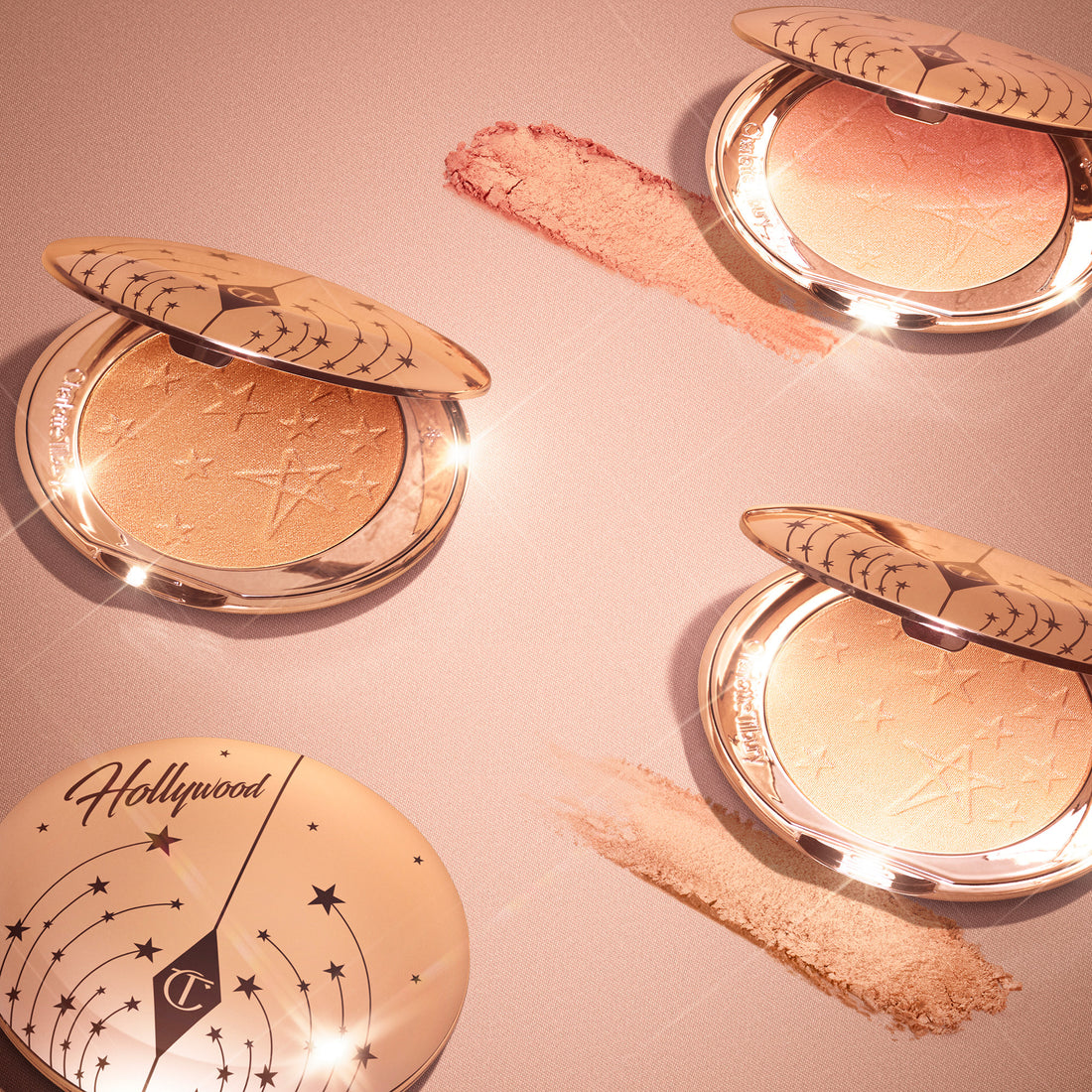 Charlotte Tilbury Hollywood Highlighter Bronze Glow textura del polvo iluminador
