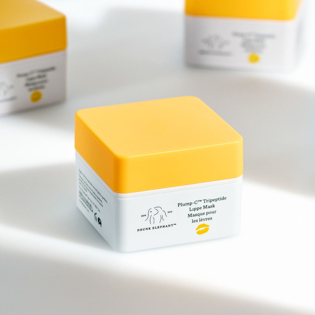 Varios potes del Plump-C Lippe Mask de Drunk Elephant, mascarilla labial con peptidos y vitamina C