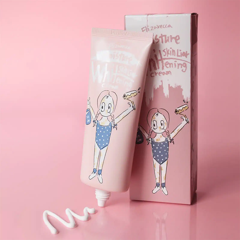 Elizavecca Skin Liar Whitening Cream junto a su caja sobre fondo rosa