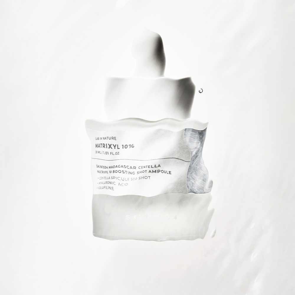 SKIN1004 Matrixyl 10 Boosting Shot Ampoule primer plano textura del envase