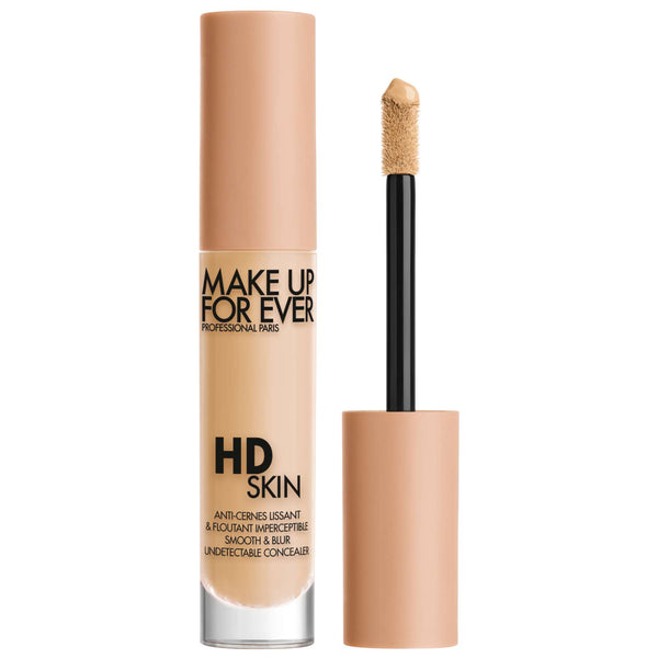 Make Up For Ever HD Skin Concealer tono 2.1 Y Biscuit con aplicador sobre fondo blanco