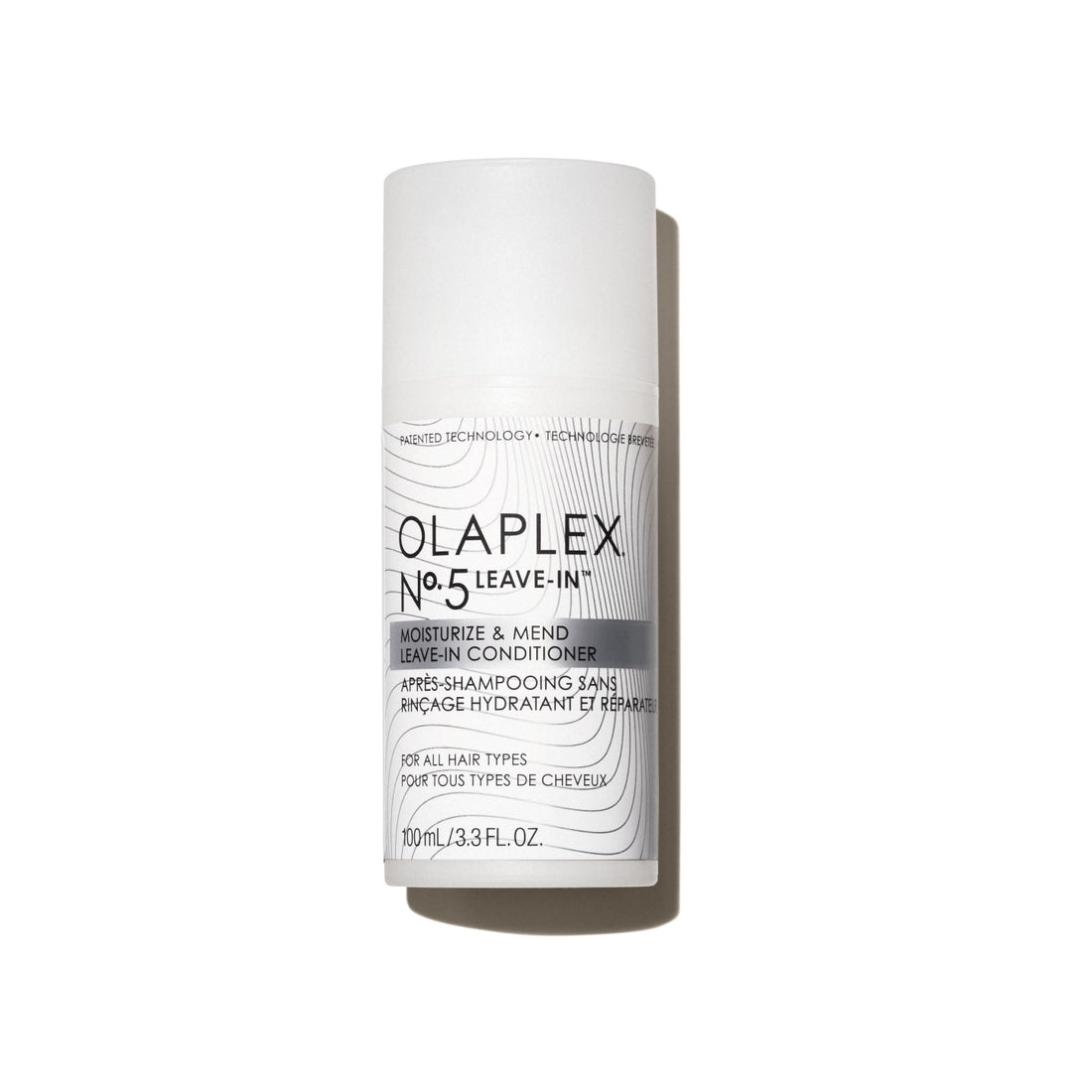 Olaplex Nº.5 Leave-In Moisturize & Mend acondicionador sin enjuague 100ml sobre fondo blanco