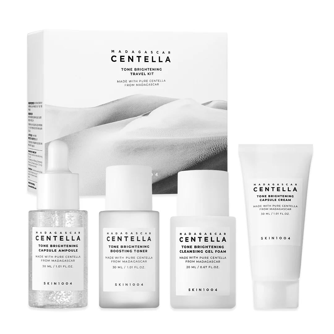 SKIN1004 Madagascar Centella Tone Brightening Travel Kit - caja y los 4 minis sobre fondo blanco