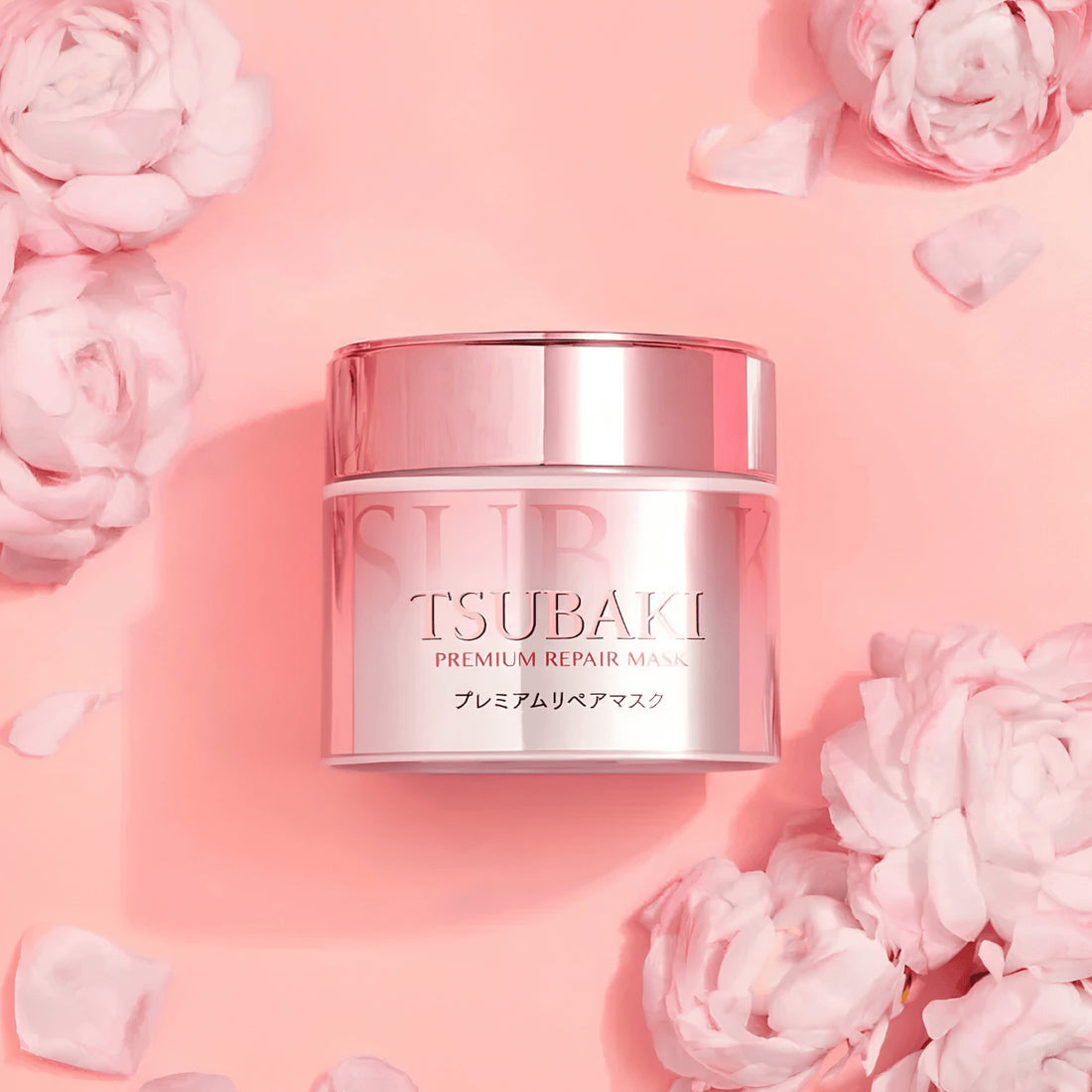 Tsubaki Premium Repair Mask Rosa - envase con flores rosas fondo rosado